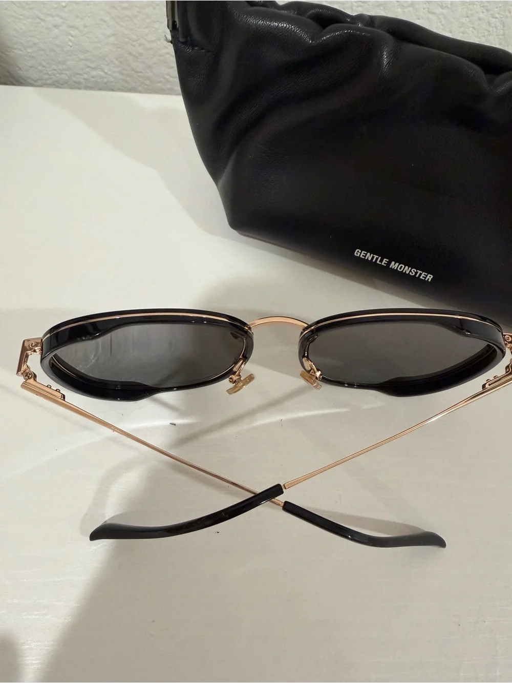 GENTLE MONSTER Black and Gold Round Sunglasses